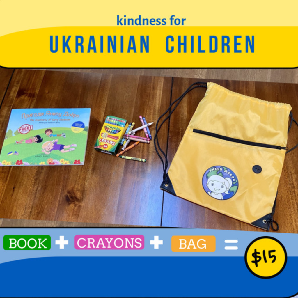 Blue text on yellow banner says Kindness for Ukrainian Children. A yellow small drawstring backpack on wood floor next to children's book and colored pencils.